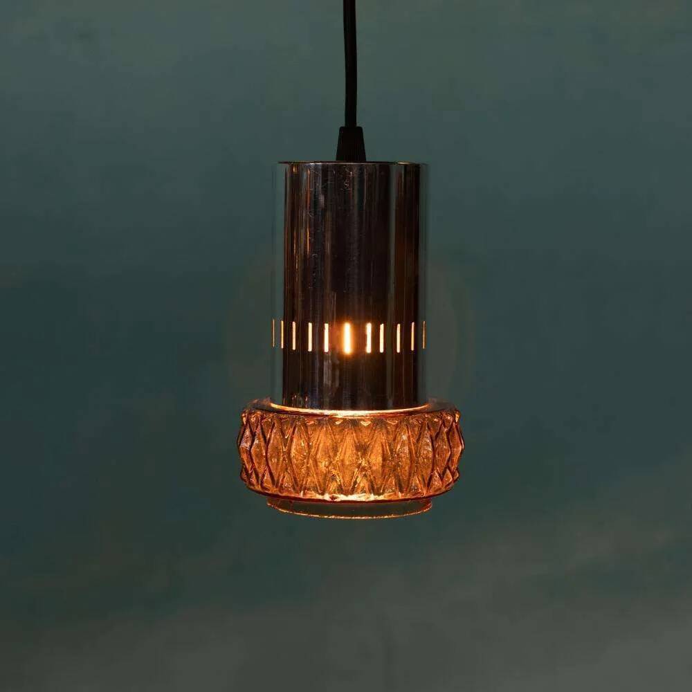 Suspended glass from the space age, mid-century glass from the 1960s.