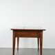 Elegant and subtle antique French dining table made of fruitwood