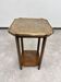 Art Nouveau side table with a hammered brass top