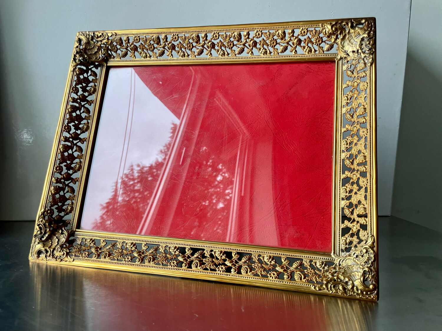 Antique xl metal frame in gold colored brass 29.5 cm x 23 cm convex glass