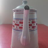 White enamelled sheet metal coffee maker with red and blue patterns