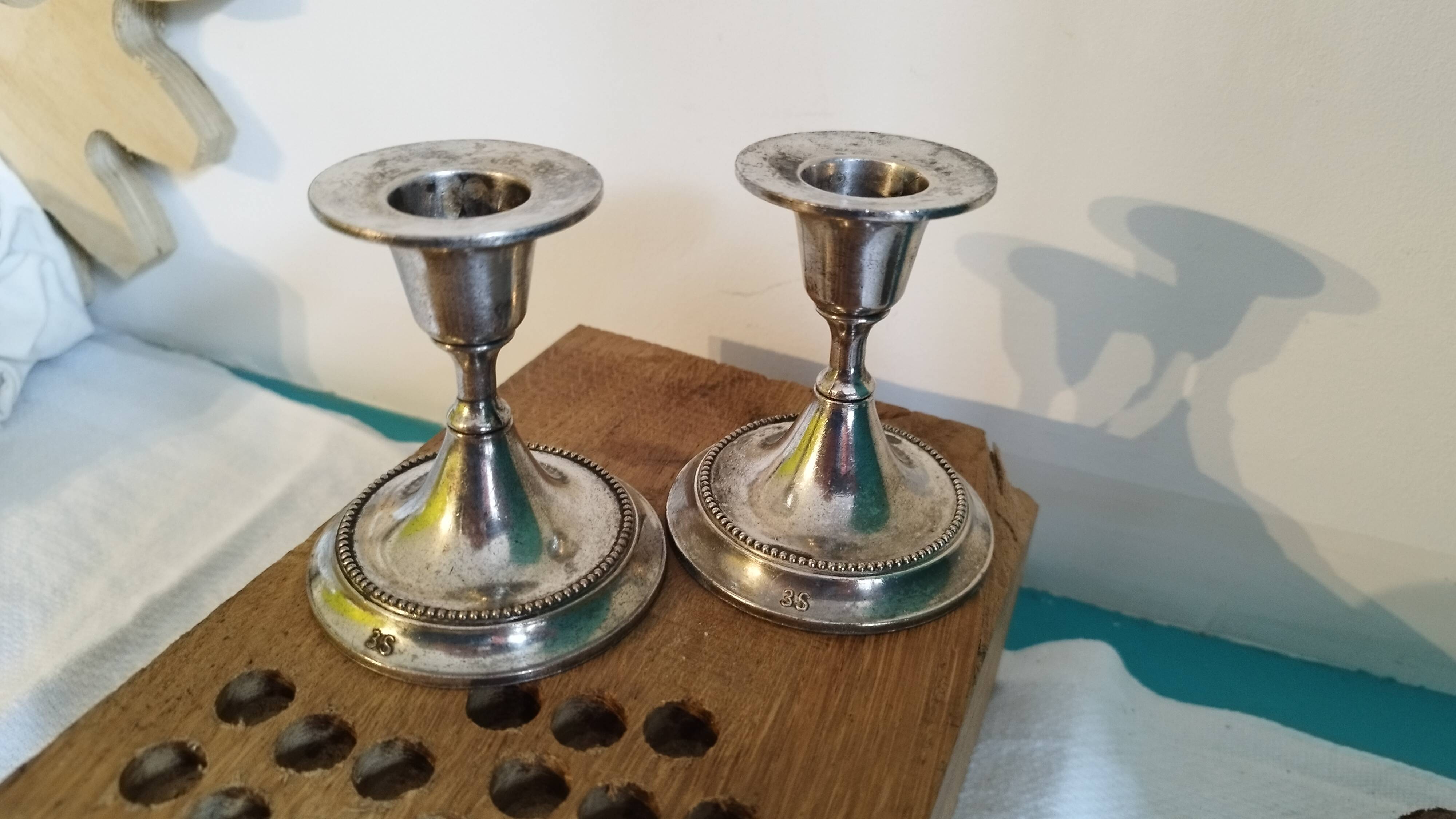 2 small silver metal candle holders