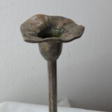 Pair of metal flower candlesticks