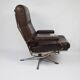 A pair of leather armchairs, 1970s