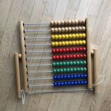 Vintage abacus in wood and primary colors