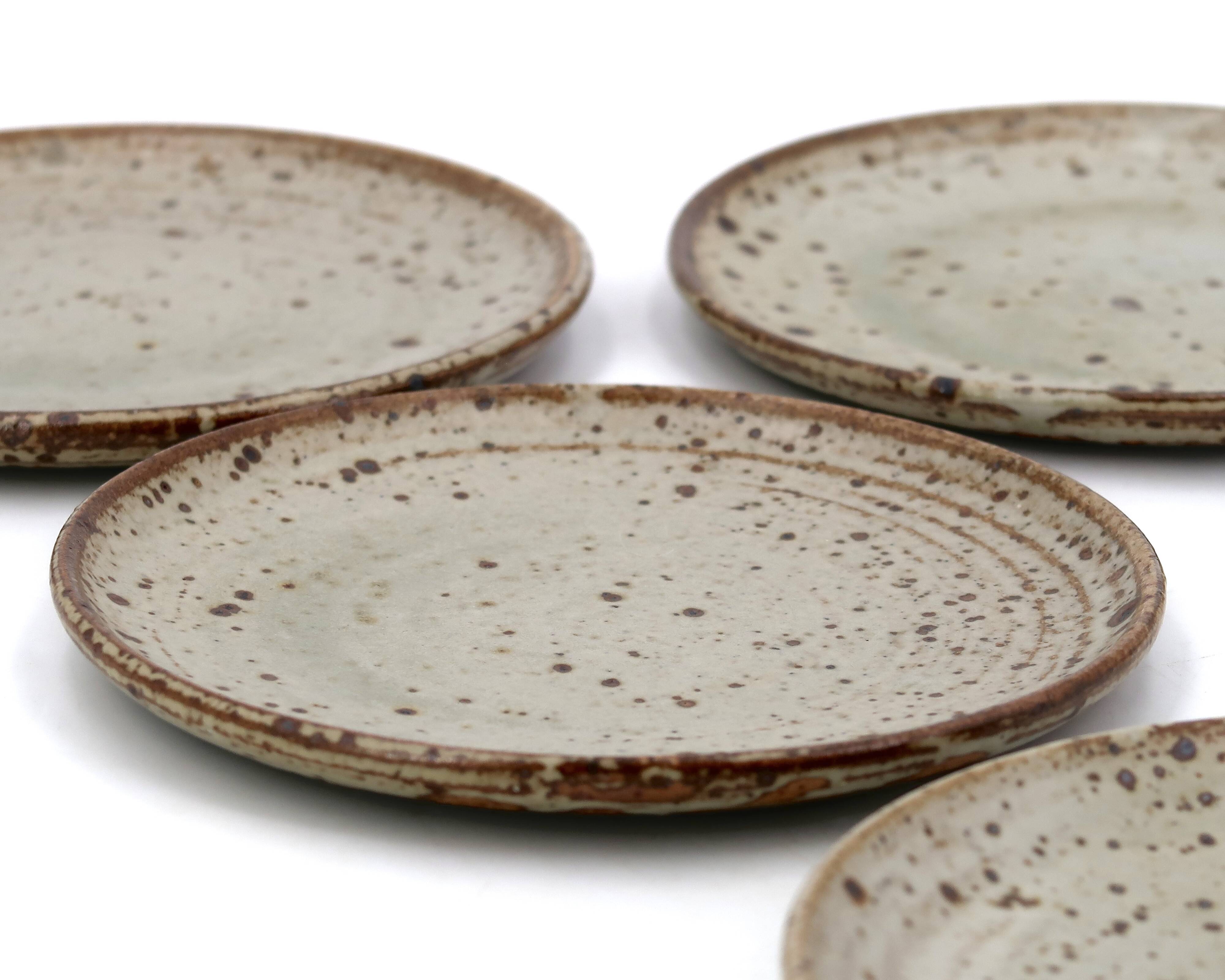 Dessert plates in pyrite stoneware by Gustave Tiffoche, ceramic from the 1970s.