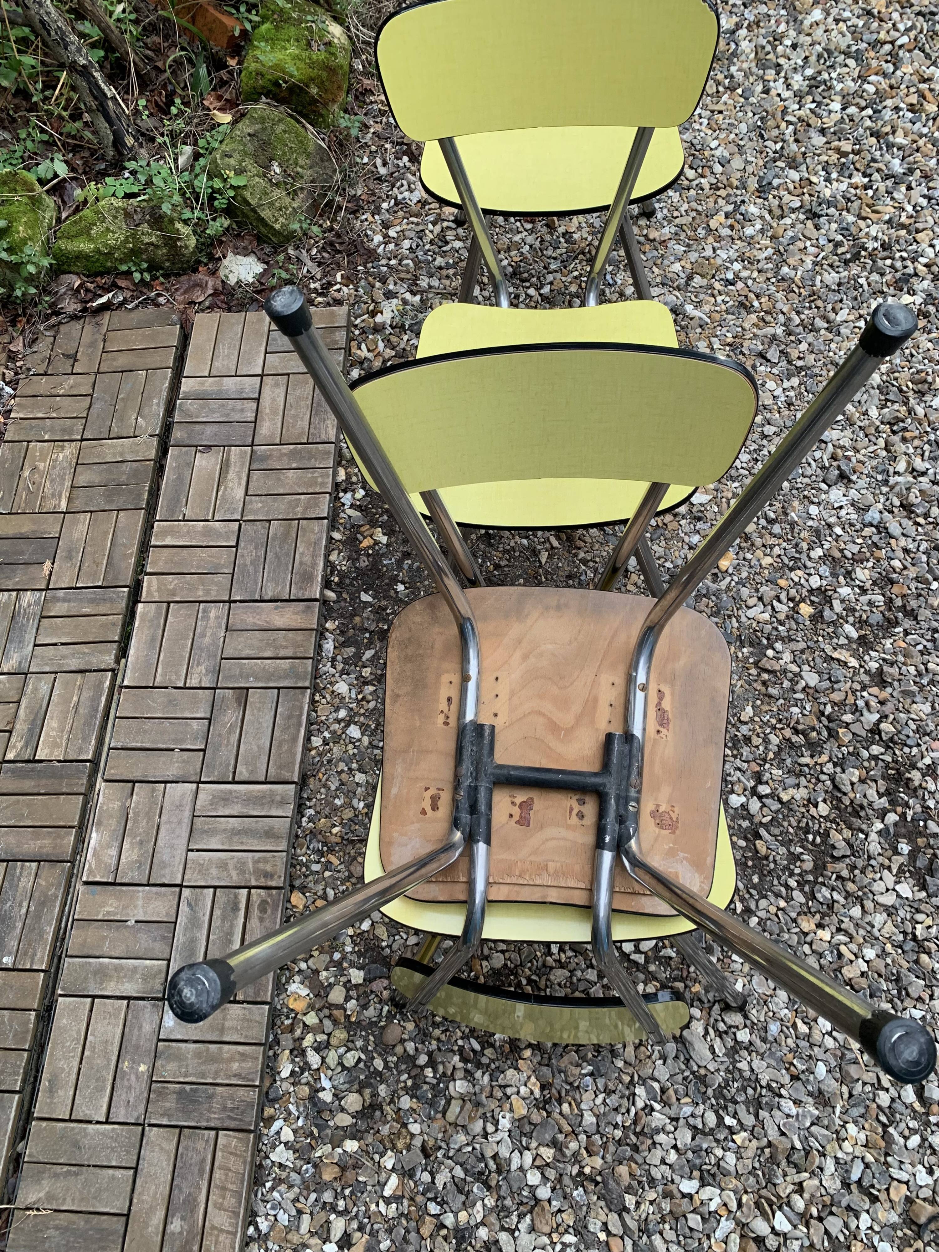 Yellow Formica chairs with compass legs, 1950s