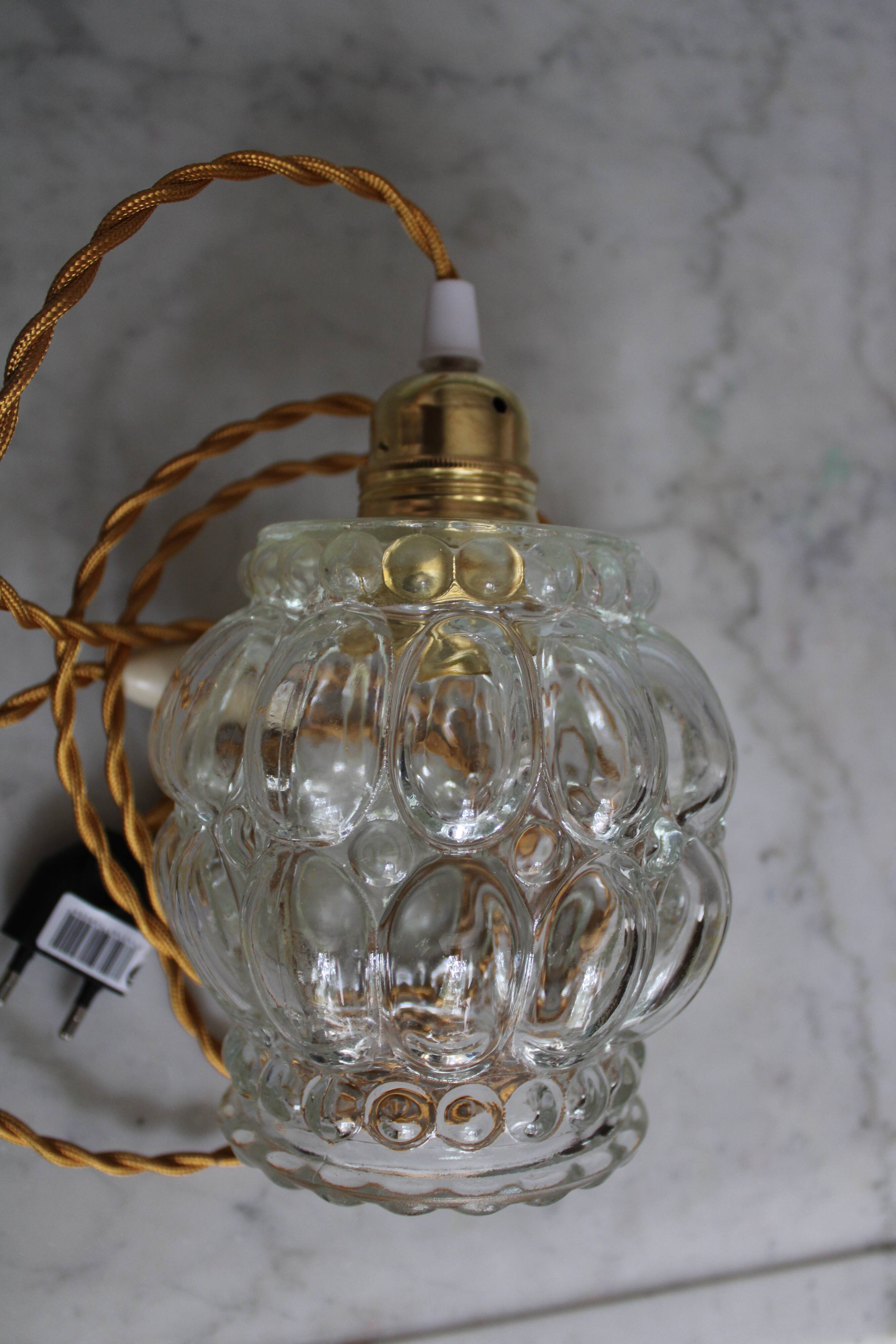 Moulded glass hand lamp