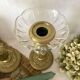 Antique brass candlesticks with glass bobeches