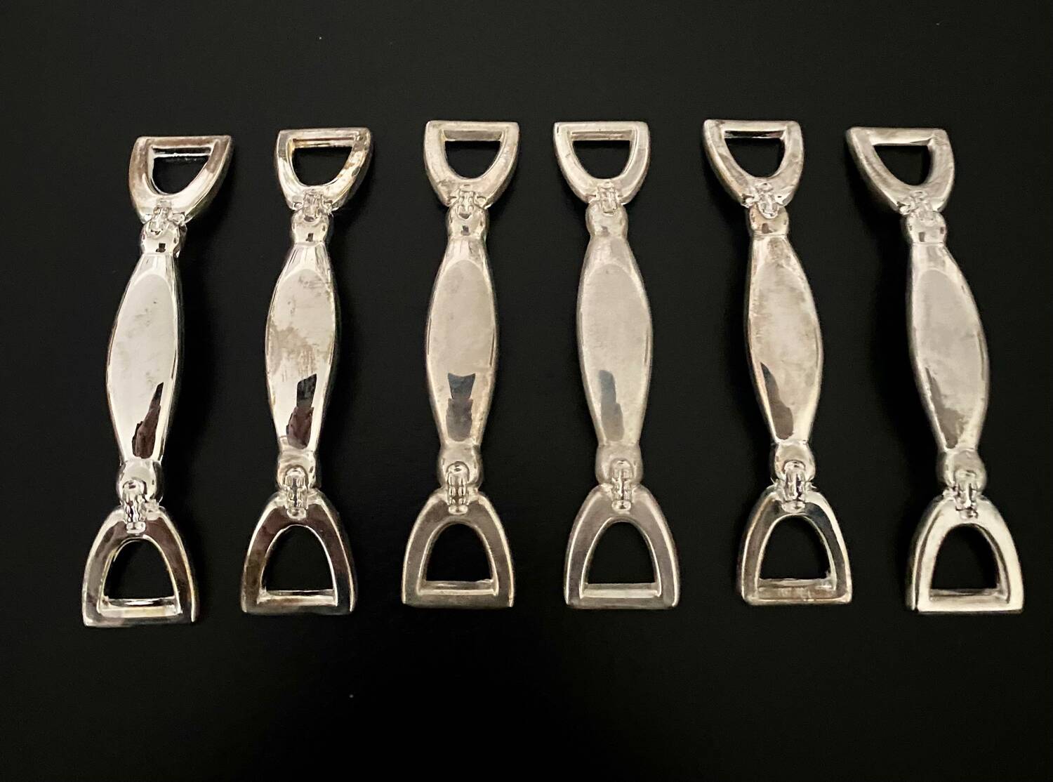 6 Silea knife holders in silver-colored metal stirrup shape