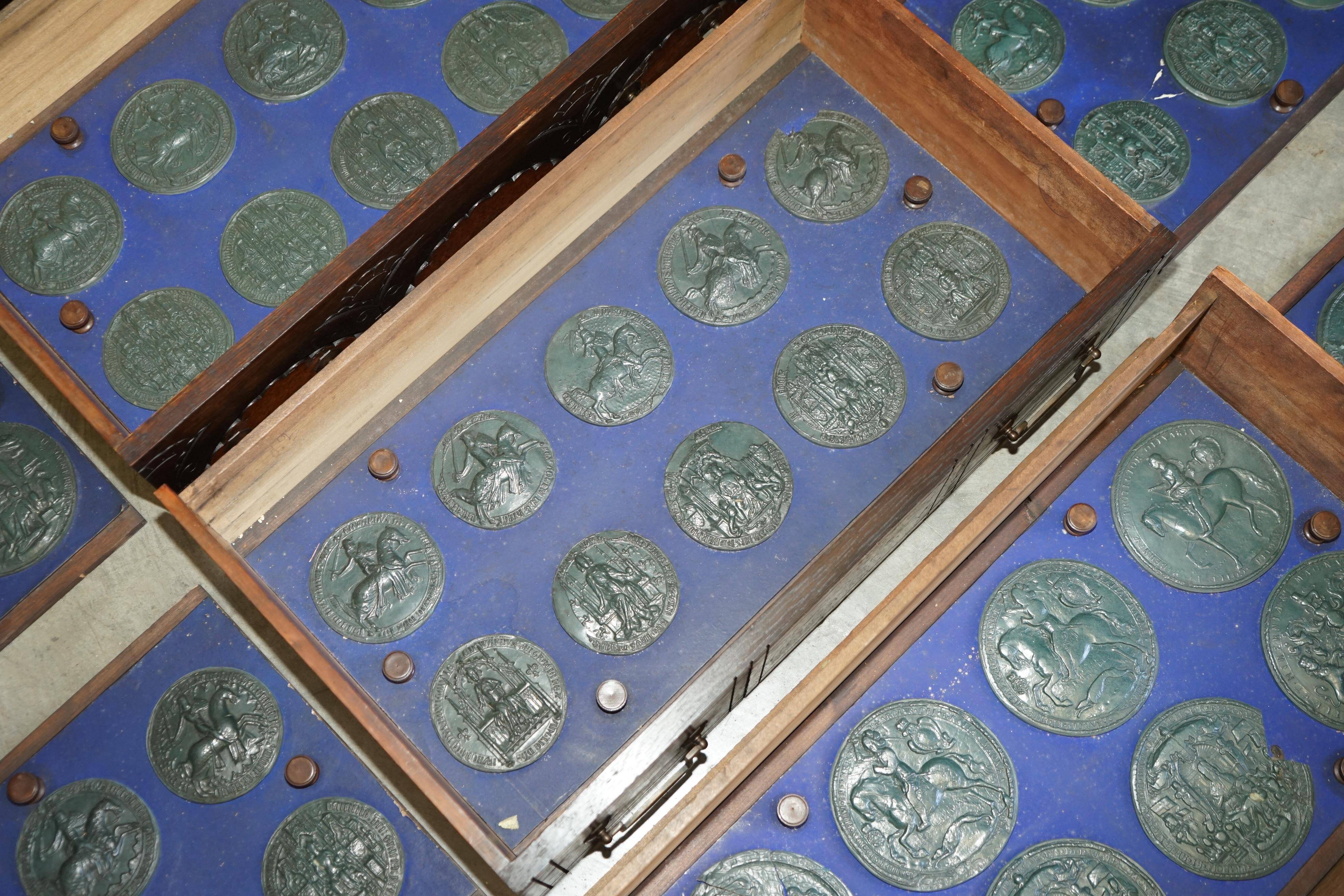 Victorian Wellington chest in figured elm by R Crosby & Son with 160 seal impressions.