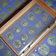 Victorian Wellington chest in figured elm by R Crosby & Son with 160 seal impressions.
