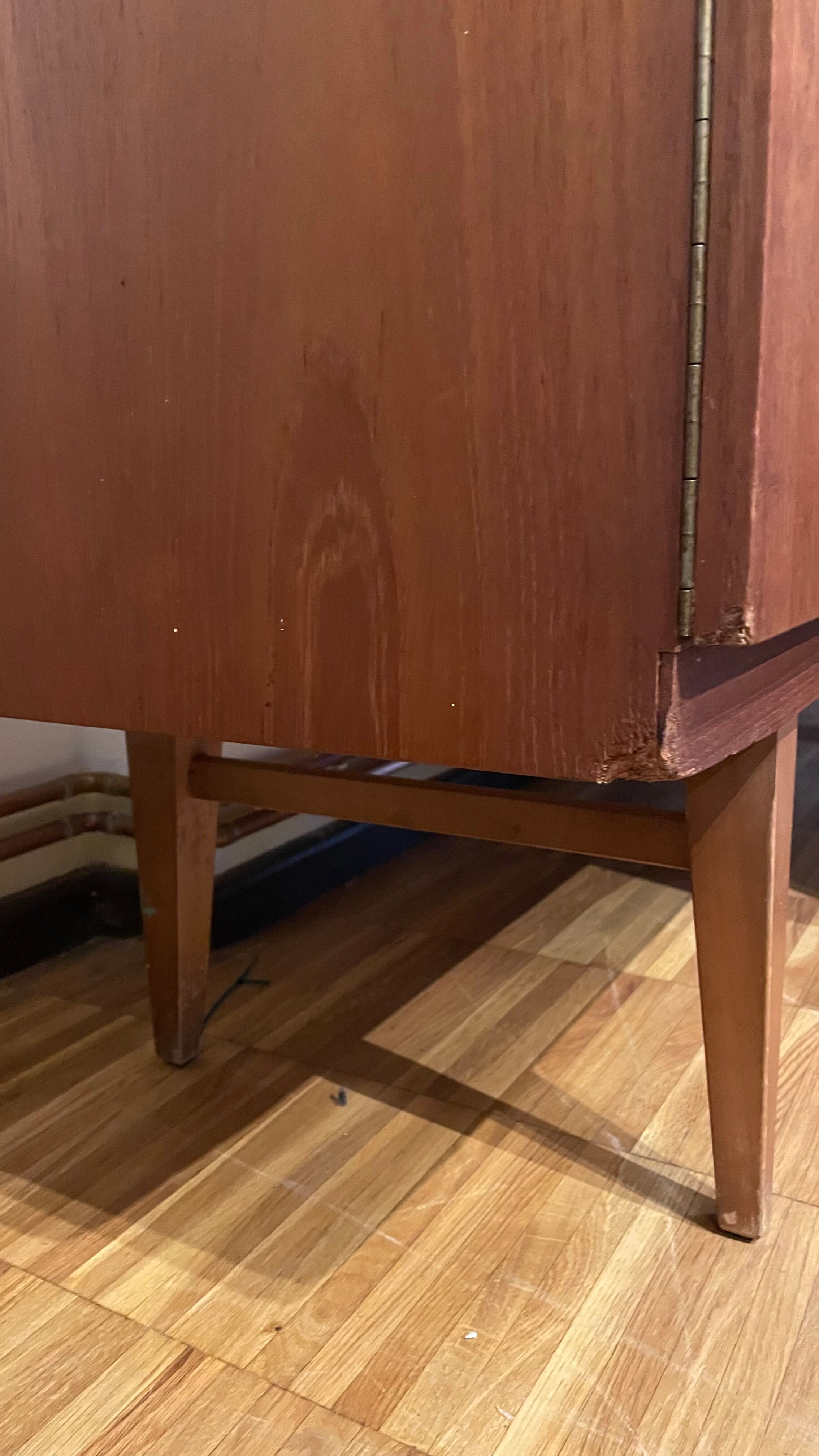 Atypical teak row from the 60s