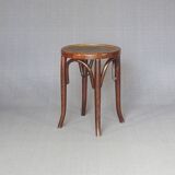 low bistro stool in curved wood laminated seat, circa 1920