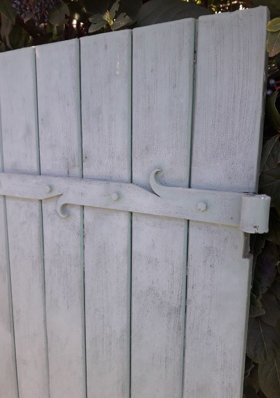 Pair of wooden iron hanging shutters