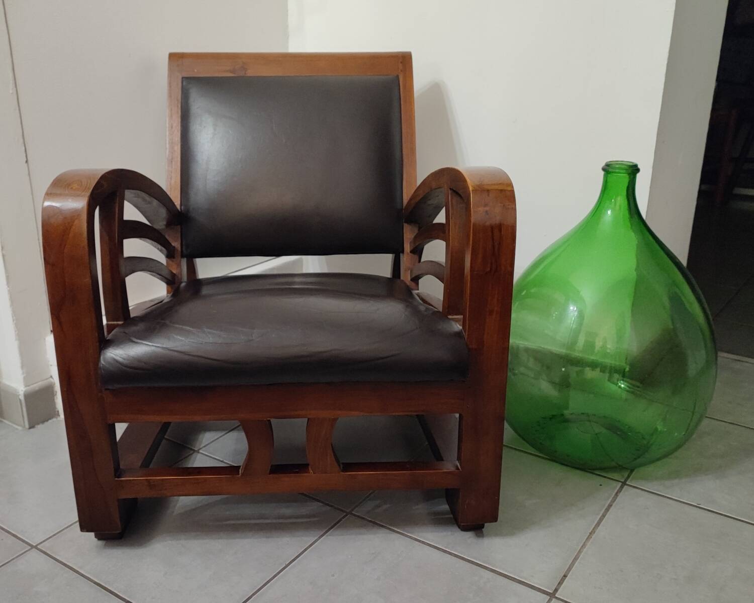 Leather and teak armchair