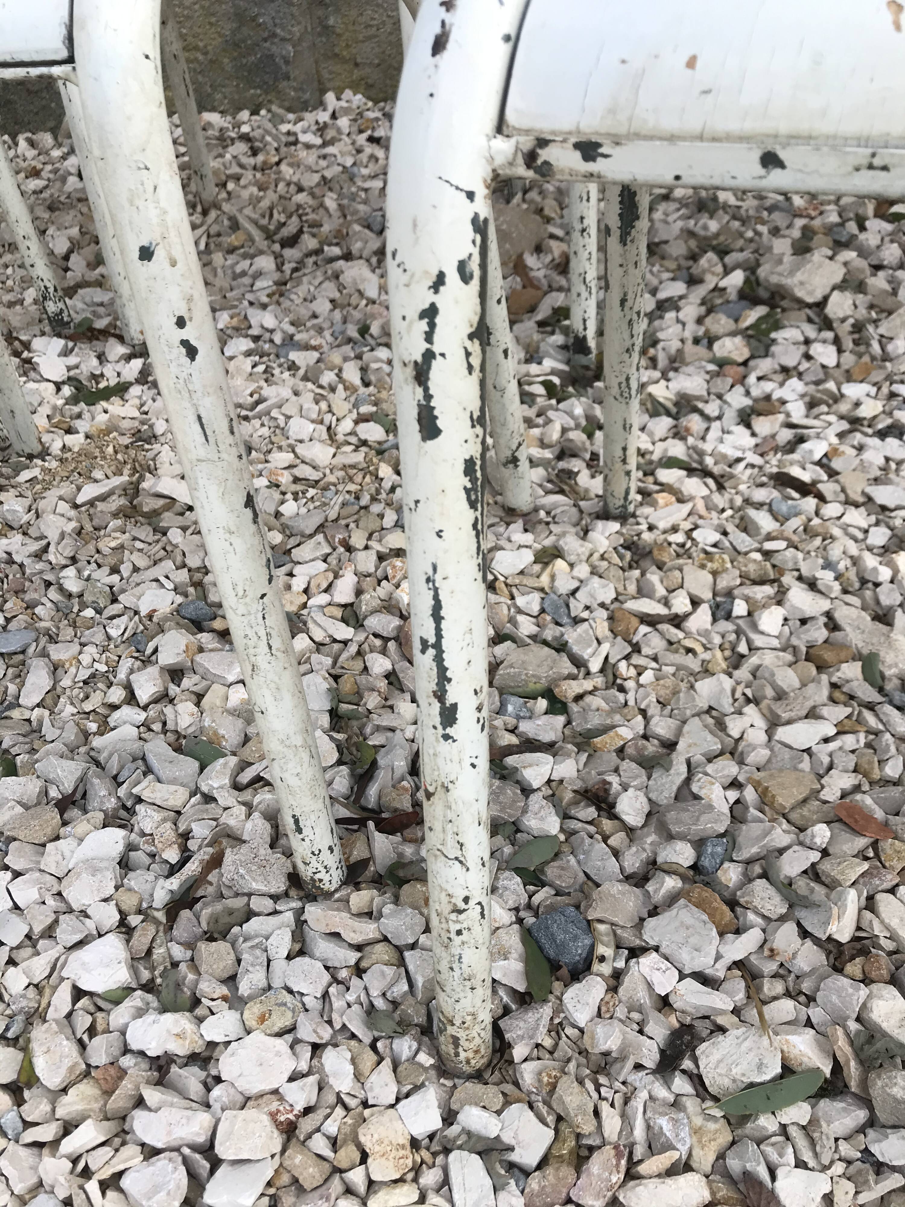 10 white school chairs