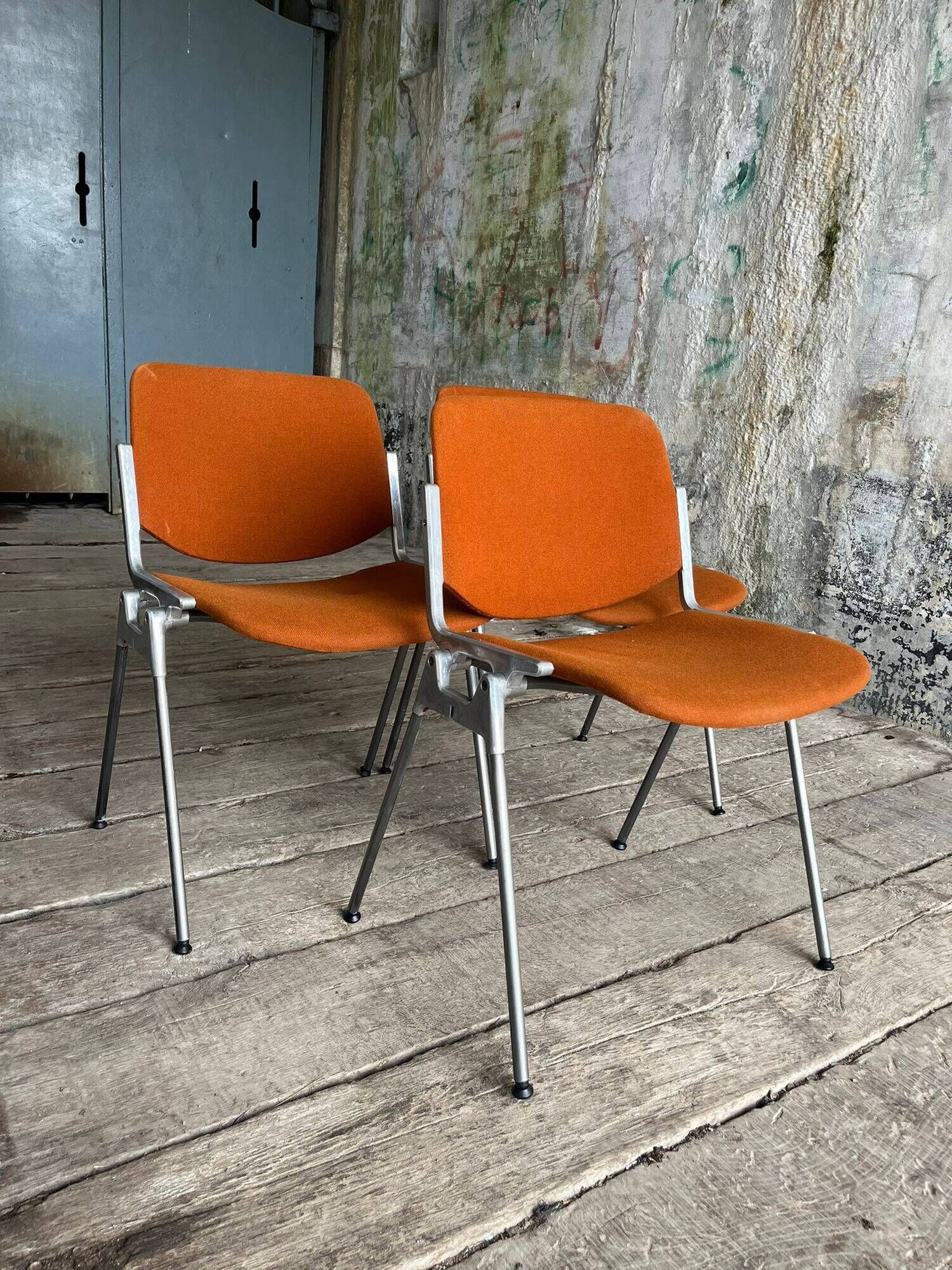 DSC 106 chair in orange by Giancarlo Piretti for Castelli, 1970s.