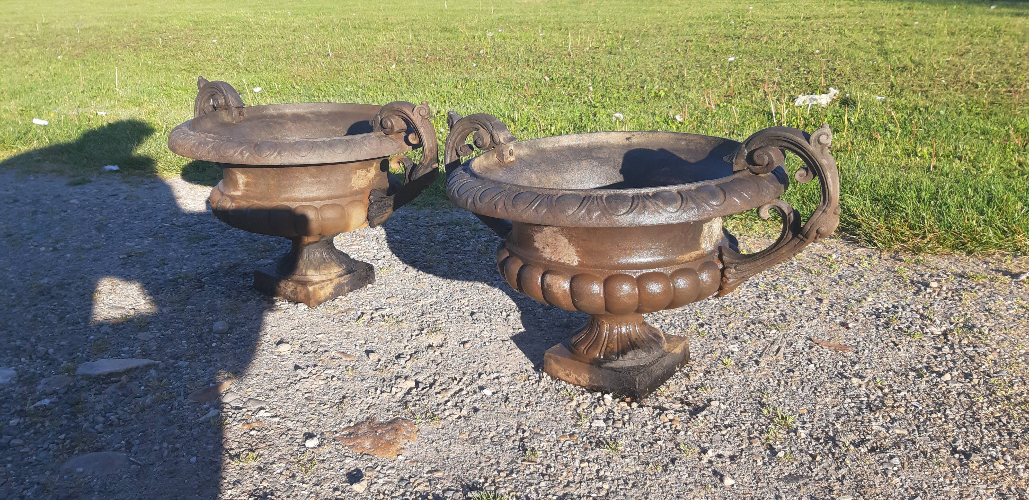 Pair of cast ear vases