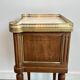 Pair of mahogany and brass side tables or bedside tables with Carrara marble tops.