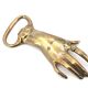 Brass hand bottle opener, 50s