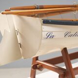 Boat-shaped coffee table reimagined with a glass top, contemporary design (after 2000)