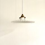 Crenellated opaline suspension