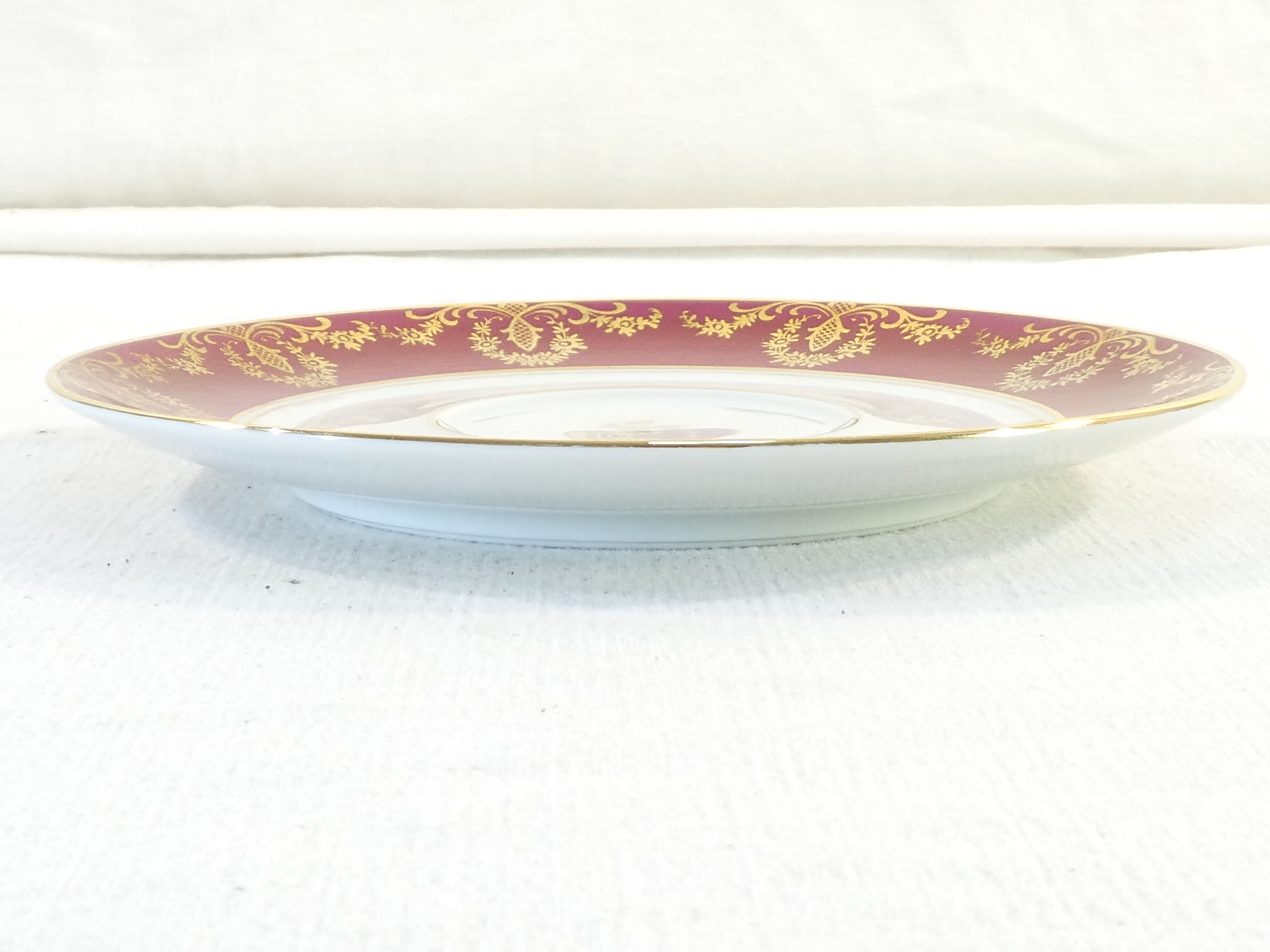 Pair of lunch cup and subcup in porcelain limoges red headband
