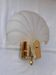 Shell-shaped glass wall light