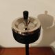 Black and gold ashtray magazine holder, mid-20th century