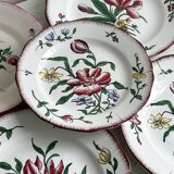 5 plates with colorful Sarreguemines floral designs.