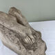 Stone sculpture, two feet on a block, signed D. Paillot.