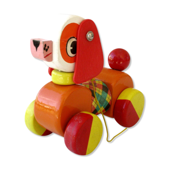 Old wooden toy, dog educalux, articulated body