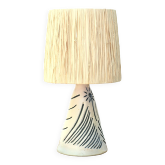 White and blue ceramic lamp, raffia shade