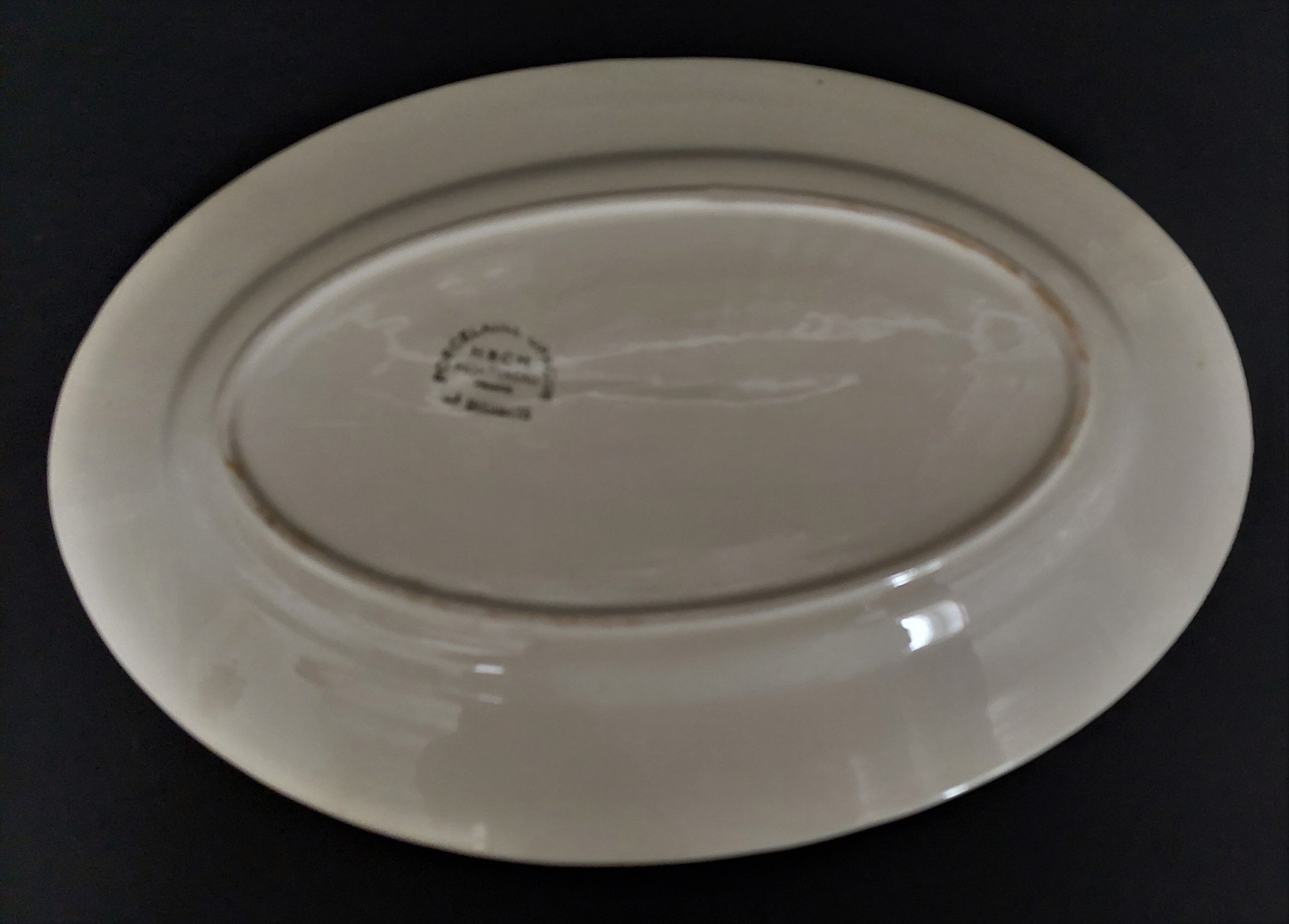 Oval earthenware serving dish HBCM Creil Montereau décor Huguette early twentieth century