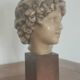 Wax head on “art deco” wooden base