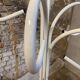Original white lacquered metal coat rack from the 1980s
