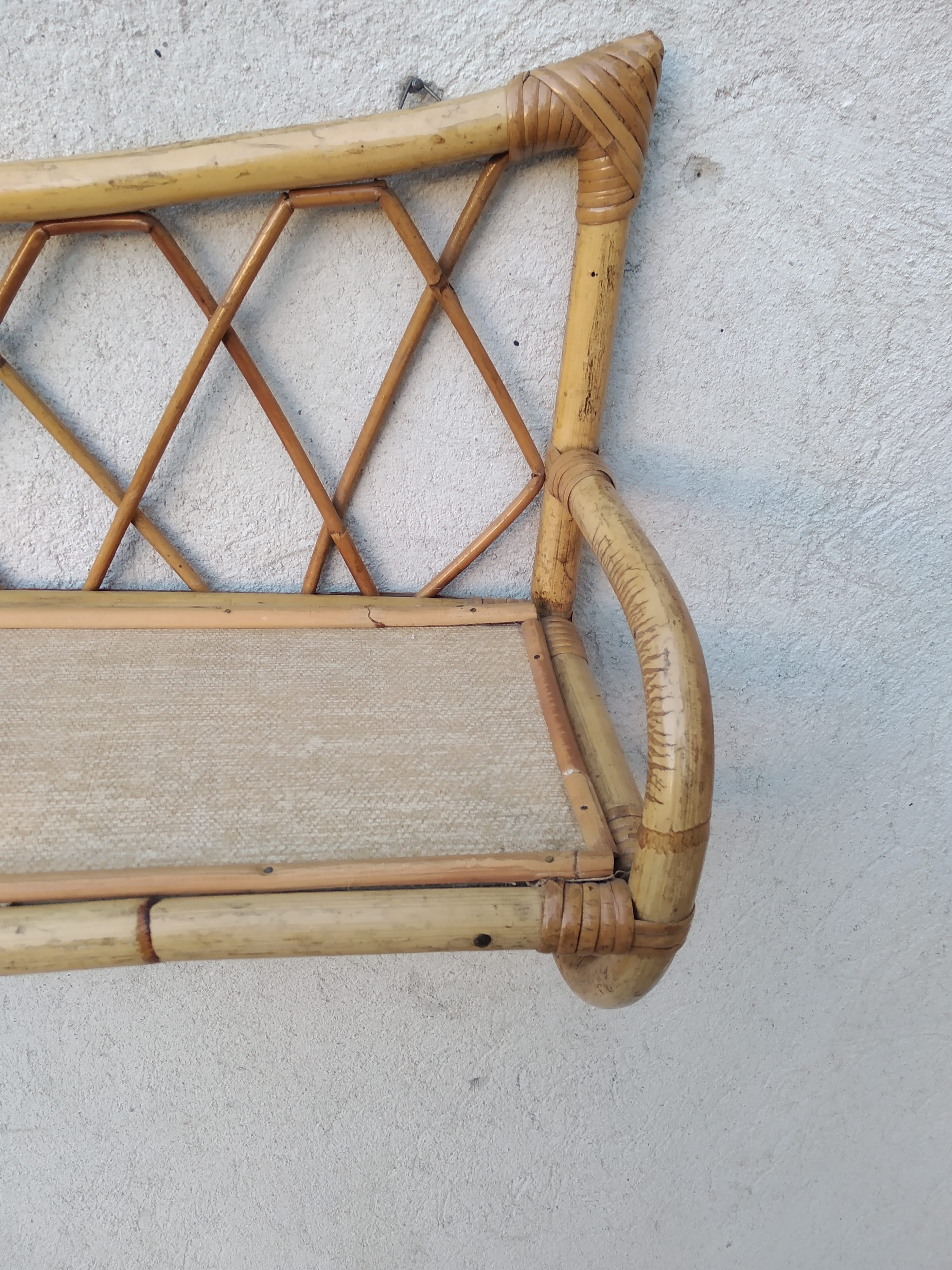 Rattan wall shelf from the 60s