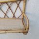 Rattan wall shelf from the 60s