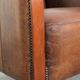 Sheepskin armchair in Art Deco style with wooden armrests
