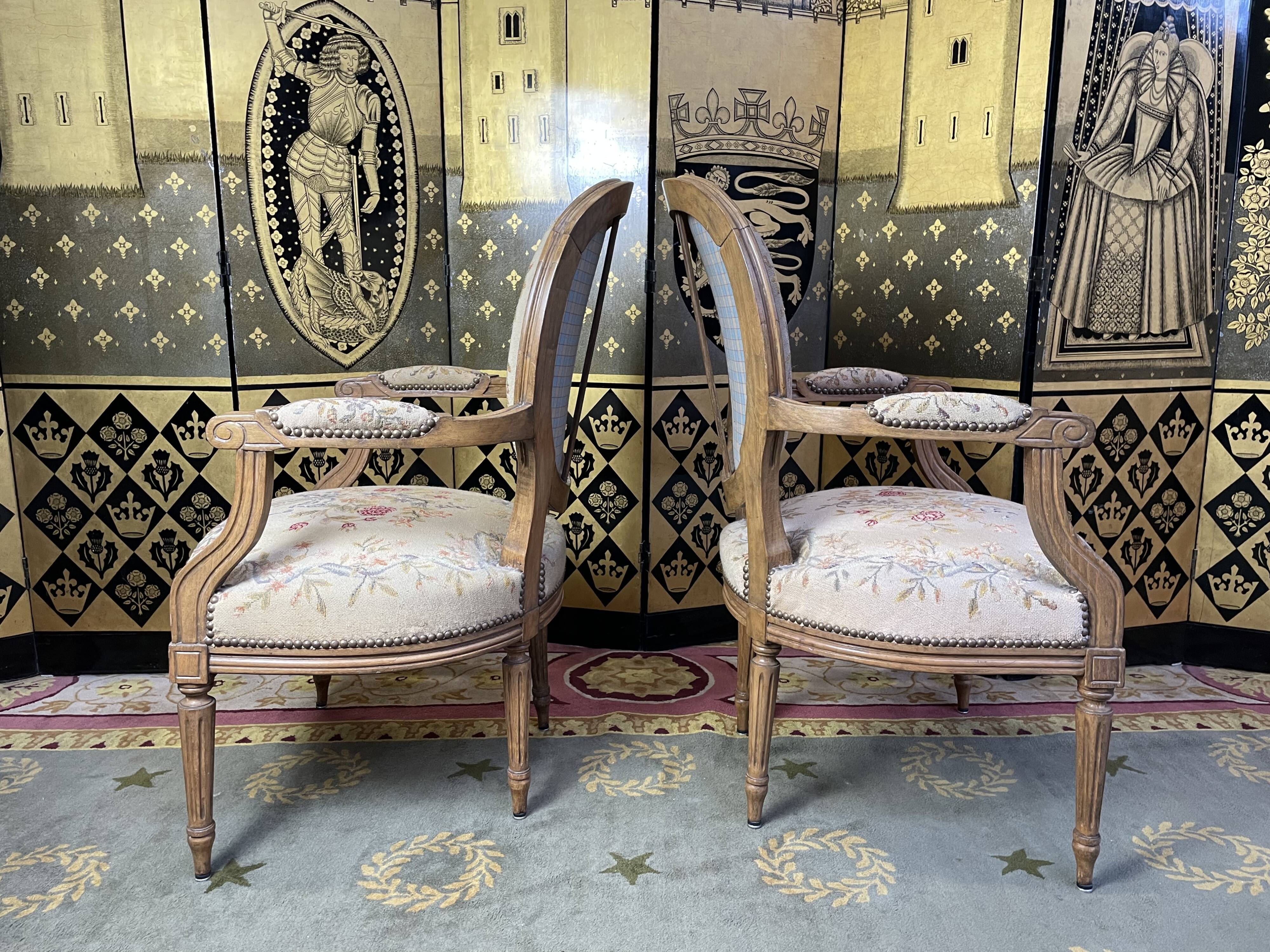 Pair of Louis XVI period medallion armchairs