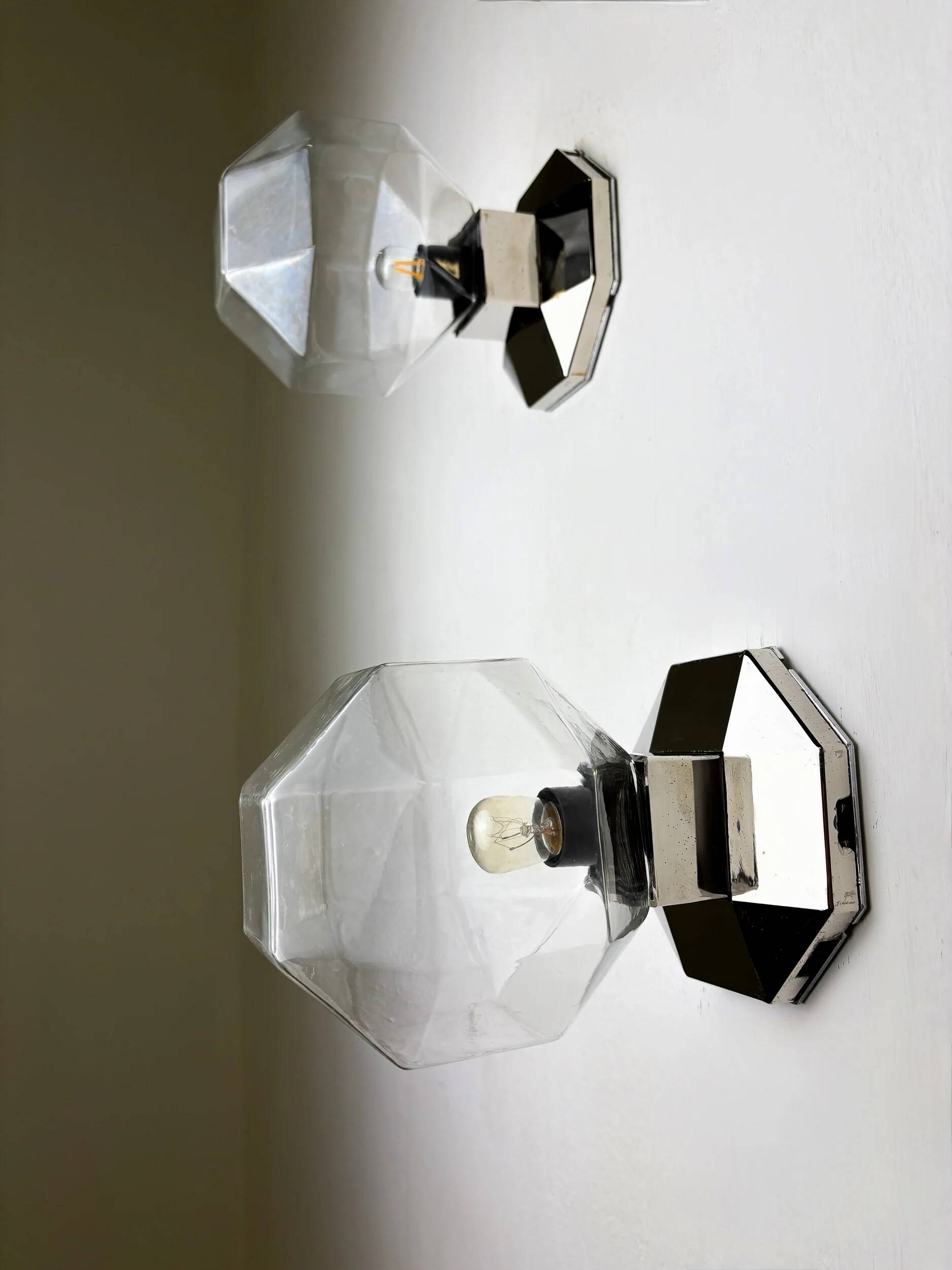 Pair of Motoko Ishii wall or flush mount lights for Staff Leuchten, Germany, 1970s