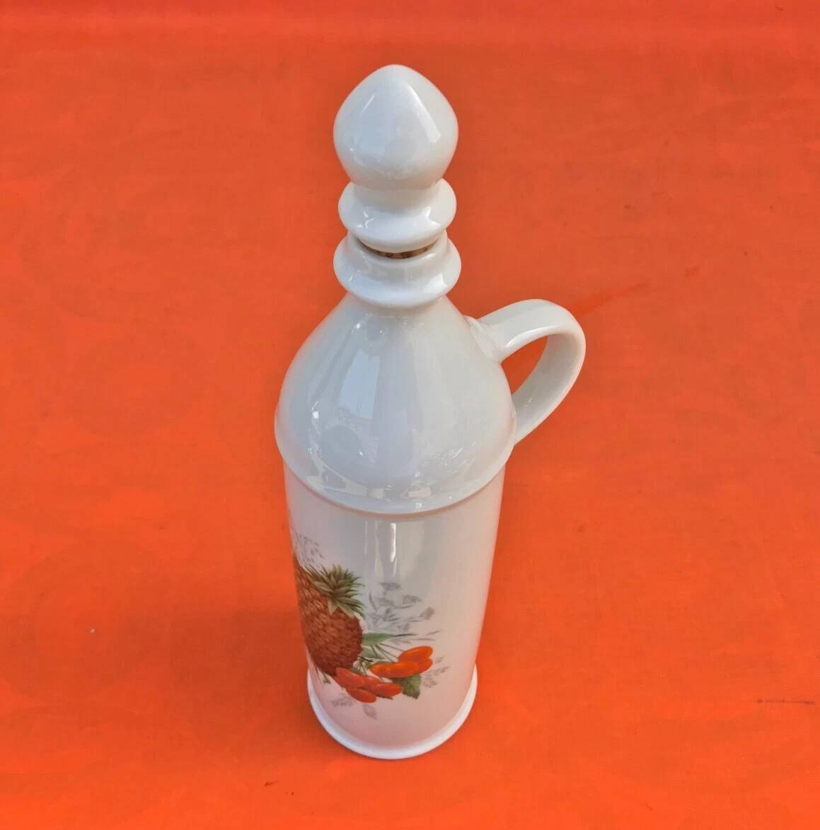 White porcelain bottle with fruit decoration