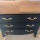 Patinated black dresser