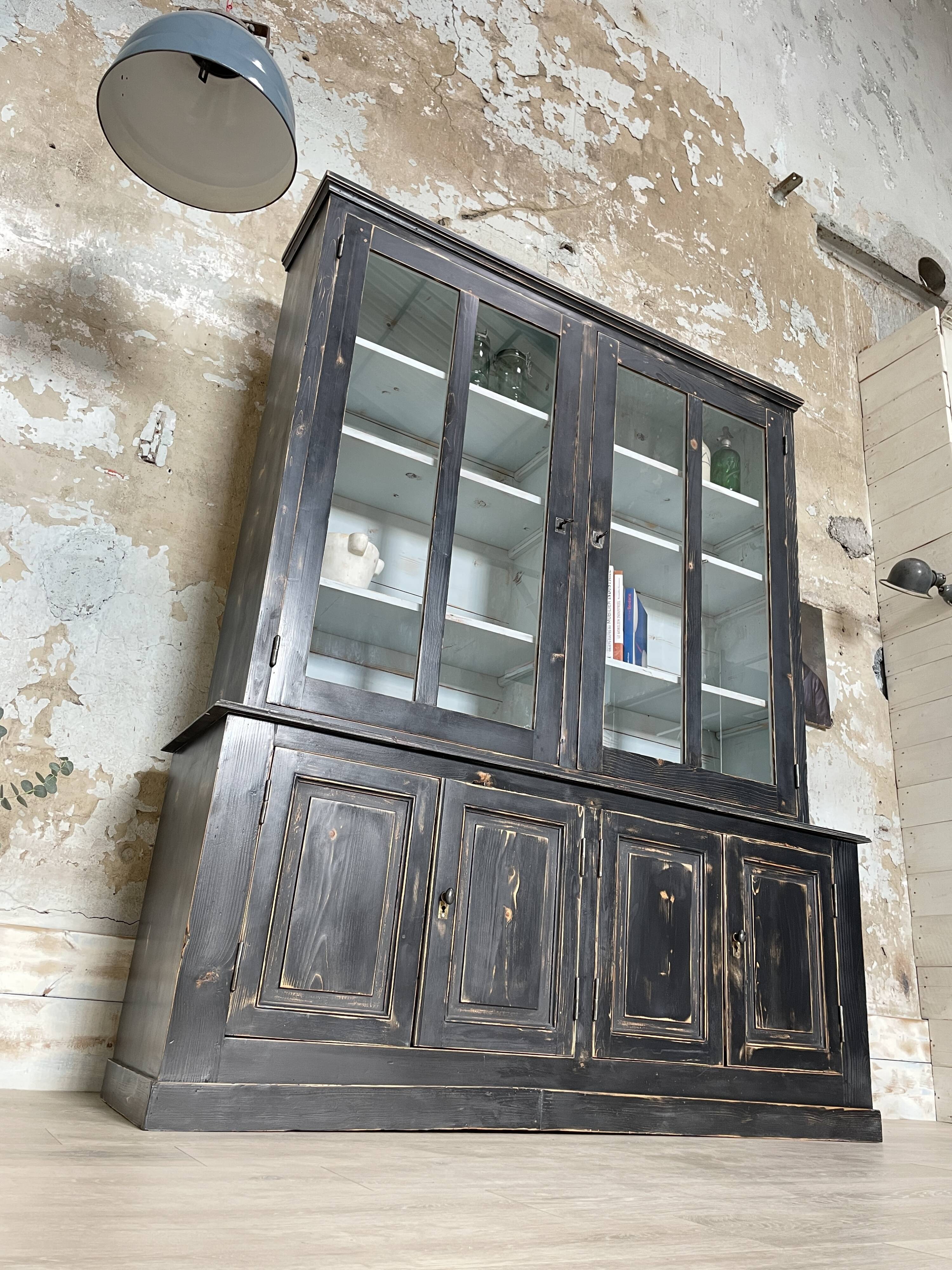 Display cabinet in patinated wood