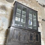 Display cabinet in patinated wood