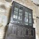 Display cabinet in patinated wood