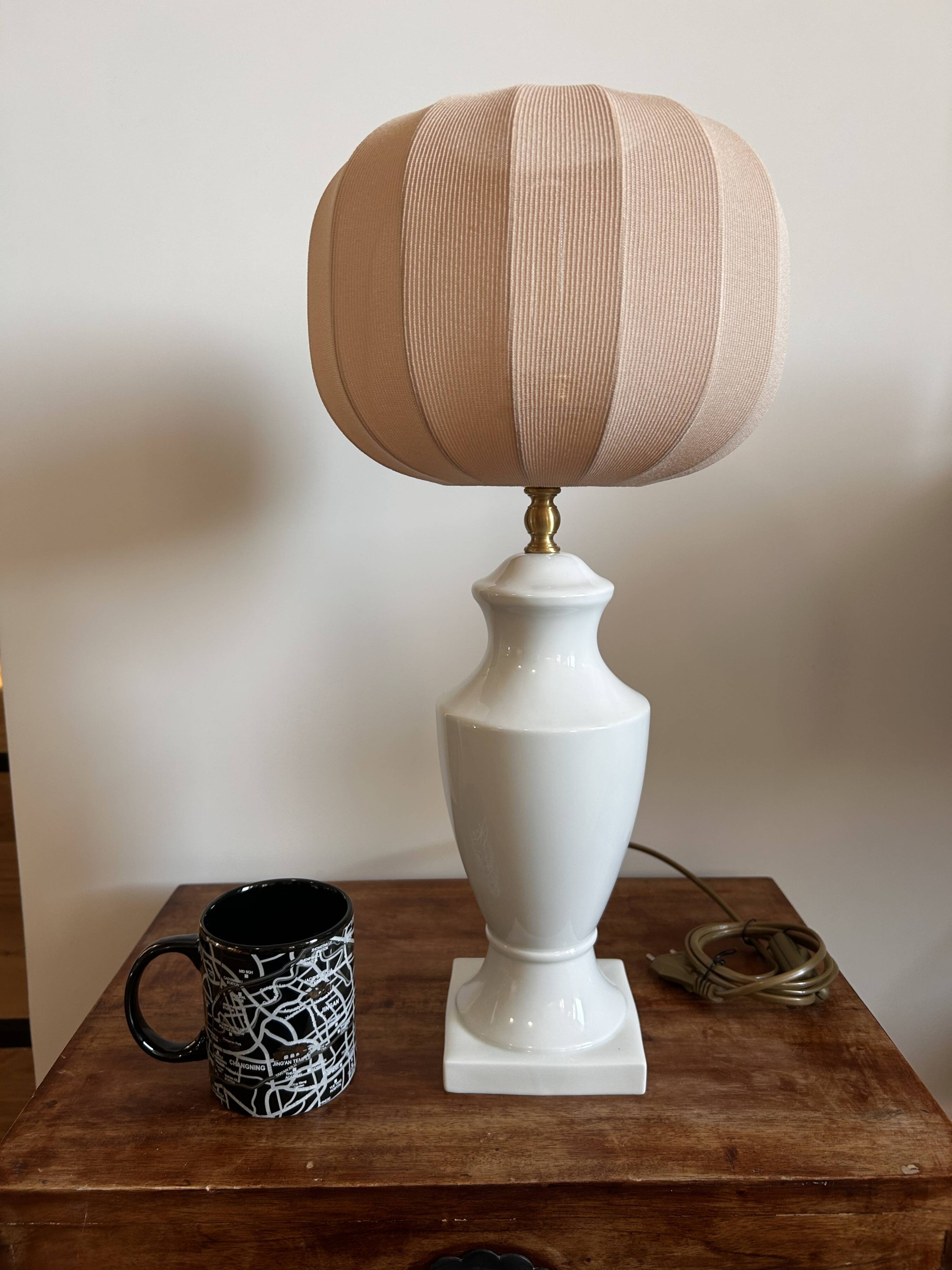 White ceramic table lamp with pastel shade