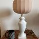 White ceramic table lamp with pastel shade