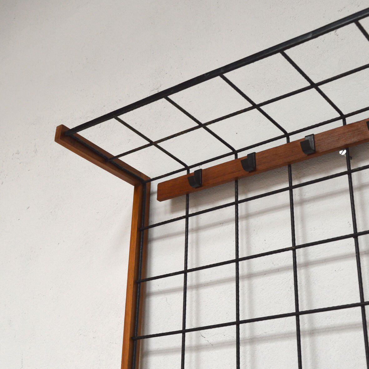 Iron and wood wall coat holders, 1960